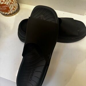 Woman’s Black Crocs Slide Sandals size 9
Extremely comfortable!